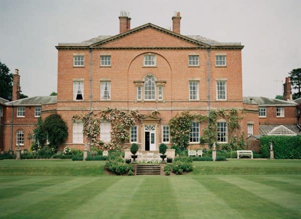 image of house covered in climbing roses norwoord park 