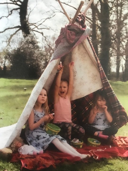 image of DIY kids teepee vintage blankets for kid-friendly patio